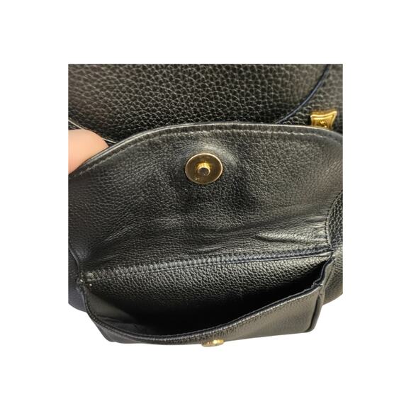 MCM Black Pebbled Leather Drawstring Backpack with Gold Accents MCM Black Pebbled Leather Mini Backpack Gold Hardware Drawstring main image 3
